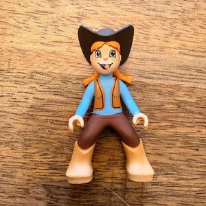 cowgirl play figure from the Lincoln Logs Sawmill Express Train set